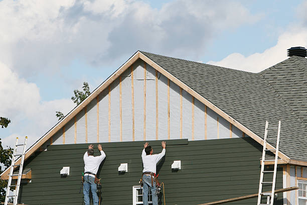 Professional Siding technician working in Hughesville, PA